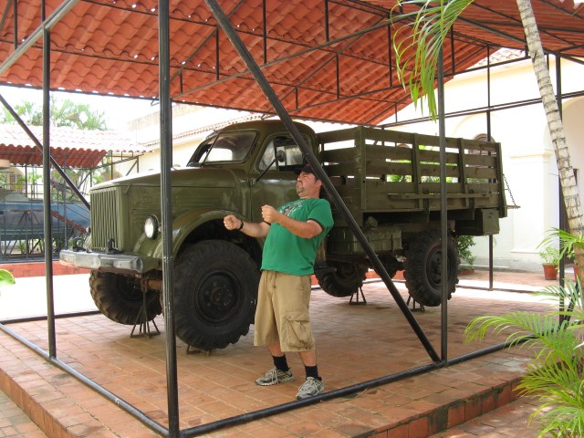 Mock-driving a Zil 14 in Trinidad, Cuba.  The Zil was a multipurpose, mid-size troop-transporter Russian truck, used extensively in military missions and civilian work all over Cuba.  This one was stationed (no engine it it), at a government museum.  